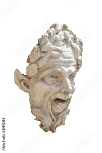 Face of Pan (Faunus). God of the wild, nature and rustic music in ancient Greek and Roman mythology. Isolated on white background. Fragment of ancient statue.