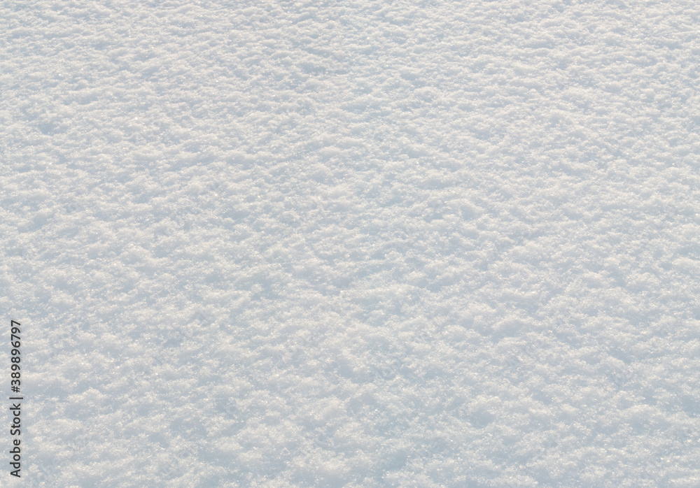 Snow surface under bright sunlight