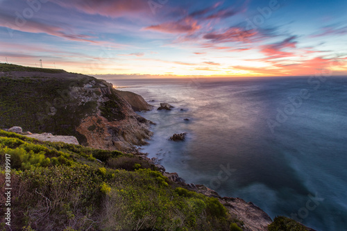 Wide angle view of dan light over the cliffs of the Oyster Catcher Trail in Mosselbay in the Garden Route in the Western Cape of South Africa