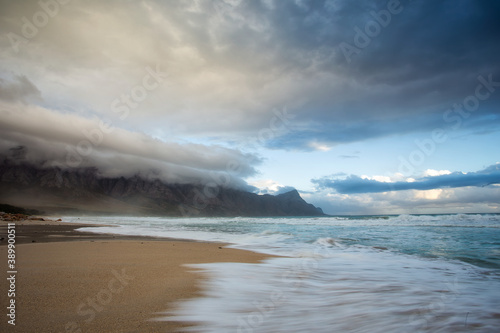 Wide angle view of Kogelbay beach as a cold winter coldfront moves in over the Western Cape of South Africa © Dewald