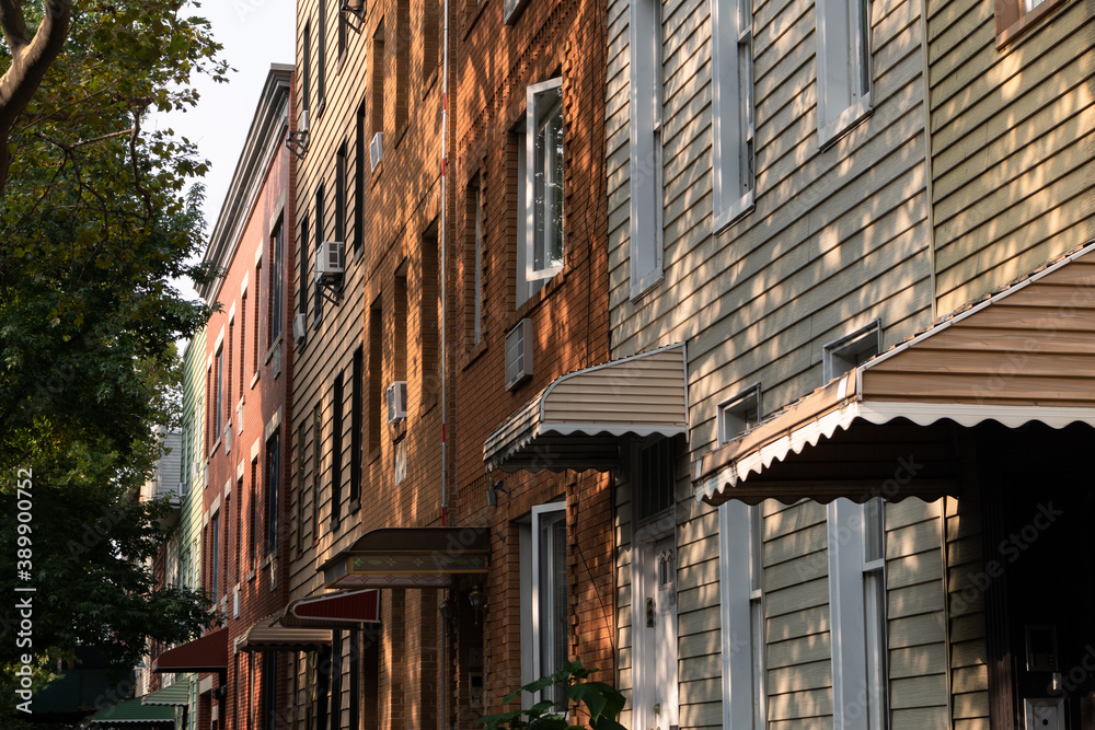Row of Awnings on Old Colorful Wood Homes in Greenpoint Brooklyn