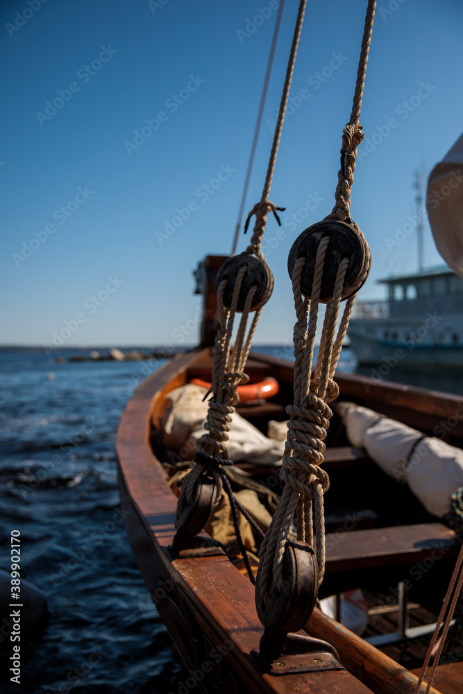 Rigging and ropes on an old sailing ship for summer sailing. Ropes on the  boat. Rook