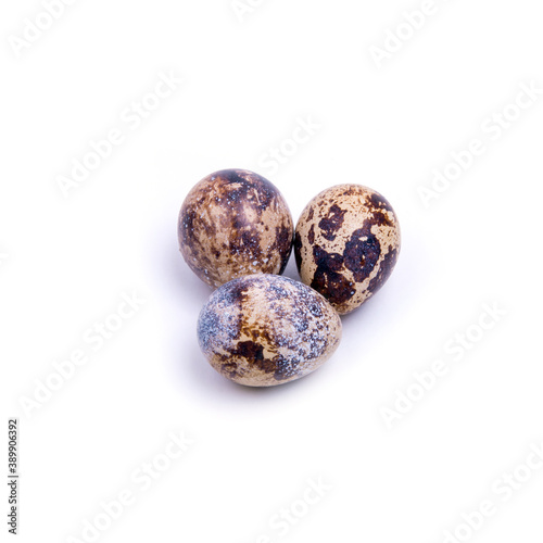 Quail eggs, close-up on a white background, copy space,