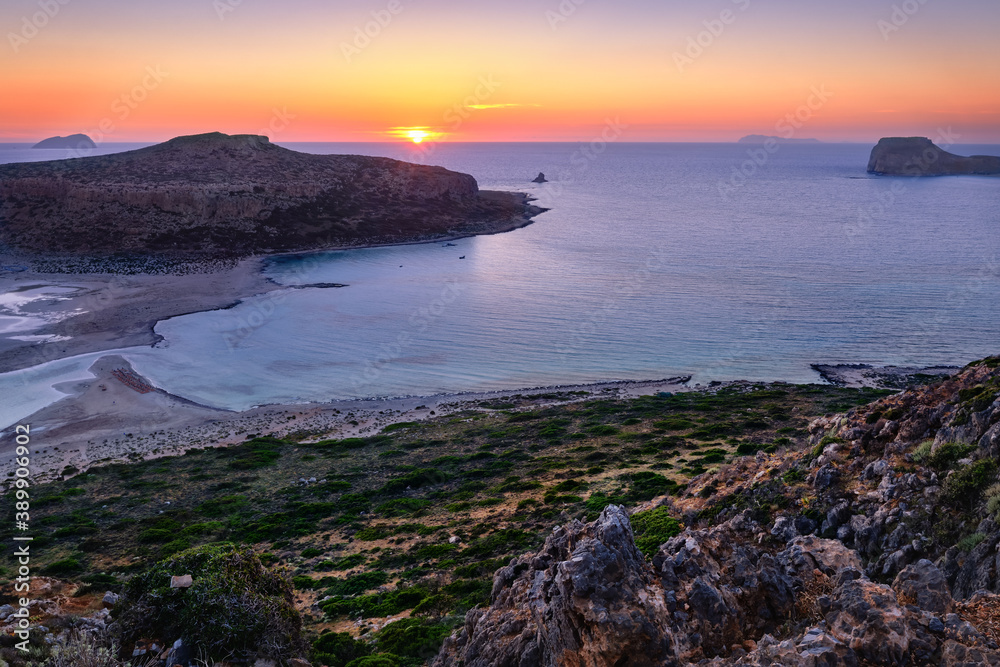 Beautiful sunset view of Cape Tigani and Gramvousa islet from Balos beach, Crete, Greece.