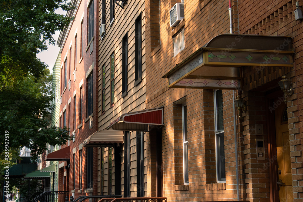 Fototapeta premium Row of Awnings on Old Colorful Wood Homes in Greenpoint Brooklyn