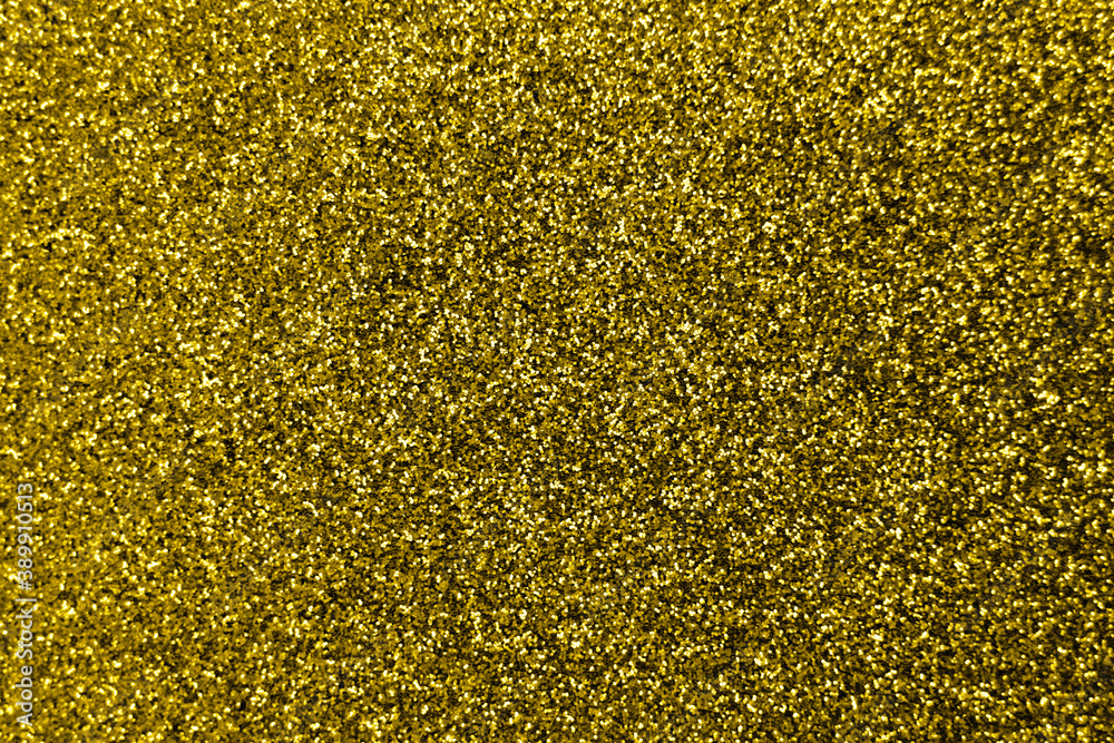 Glitter splash and lens flare on gold shiny trendy background. Sequins. Festive background for your projects. Blurred golden festive bokeh lights. Christmas festive time concept on background. Glitter splash and lens flare on gold shiny trendy background. Sequins. Festive background for your projects. Blurred golden festive bokeh lights. Christmas festive time concept on background.