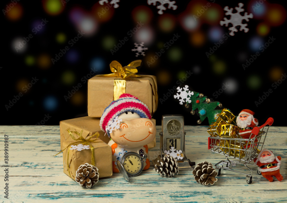 christmas still life with santa claus, clocks and gifts