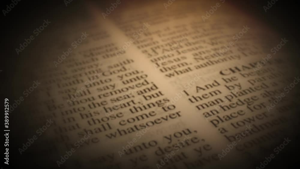 Abstract Old Vintage Holy Bible Pages Background Animation/ 4k animation of an old abstract vintage retro holy bible page background with blur and glow effect