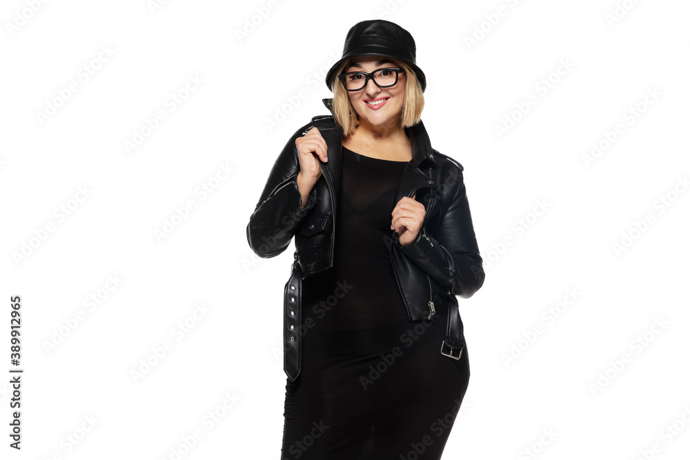 Modern. Beautiful young blonde woman in total black attire, outfit and eyewear isolated on white studio background. Magazine style, fashion, beauty concept. Fashionable posing. Copyspace for ad. Modern. Beautiful young blonde woman in total black attire, outfit and eyewear isolated on white studio background. Magazine style, fashion, beauty concept. Fashionable posing. Copyspace for ad.