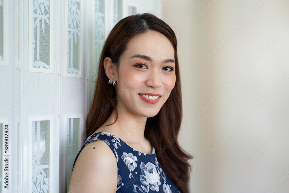 Portrait of beautiful Asian woman smiling brightly looking at the camera Portrait of beautiful Asian woman smiling brightly looking at the camera