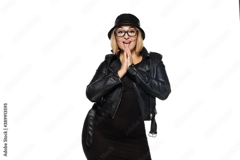 Pretty. Beautiful young blonde woman in total black attire, outfit and eyewear isolated on white studio background. Magazine style, fashion, beauty concept. Fashionable posing. Copyspace for ad. Pretty. Beautiful young blonde woman in total black attire, outfit and eyewear isolated on white studio background. Magazine style, fashion, beauty concept. Fashionable posing. Copyspace for ad.