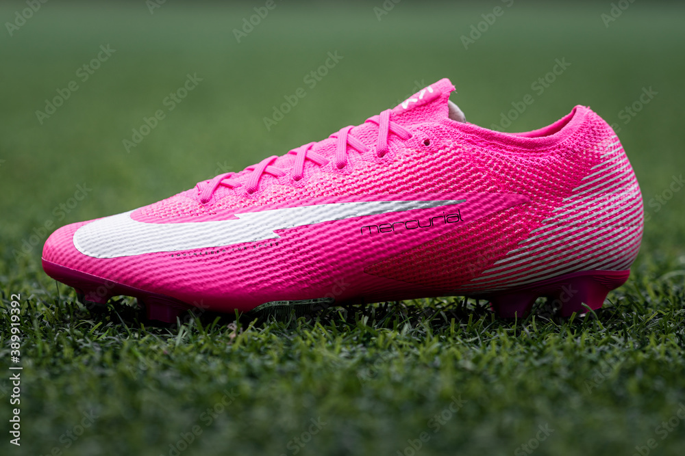 Bangkok / Thailand - September 2020 : Nike launch the new "Mercurial Vapor  XIII" football shoe as special edition for Kylian Mbappe in bright pink  berry colorway. Close-up and selective focus. foto