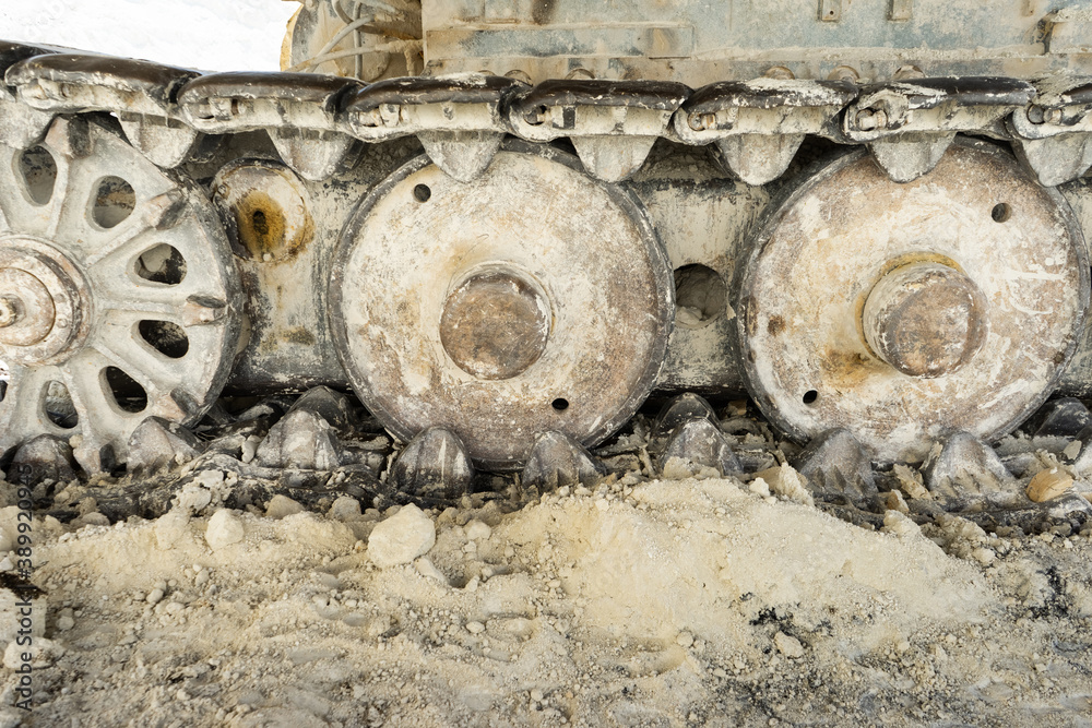 Rollers and track of a large self-propelled machine close up. Rollers and track of a large self-propelled machine close up.