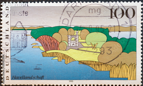 GERMANY - CIRCA 1995: a postage stamp from Germany, showing a graphic of the Havel landscape in Berlin (Pfaueninsel). photo