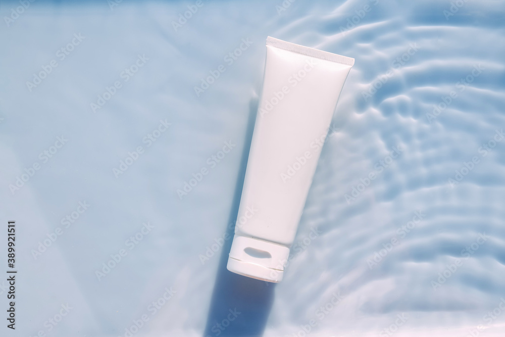 Cosmetic moisturizer cream , micellar toner, or emulsion with granules. abstract beauty background. Reflections of scattered sun texture. Cosmetic moisturizer cream , micellar toner, or emulsion with granules. abstract beauty background. Reflections of scattered sun texture.