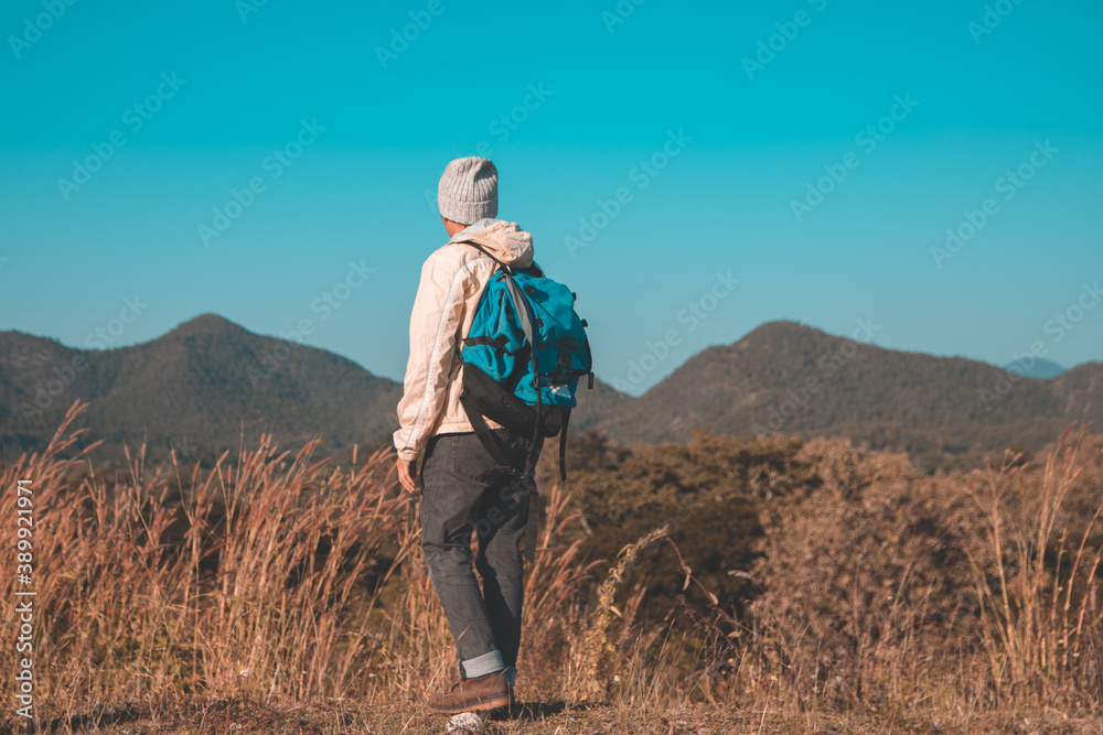 Soft focus blur Asian young men 25-30 year selfie standing Turn around hiking joy with mountain blue sky landscape nature hiking outdoor at reservoir MEATIP Lamphun Thailand Soft focus blur Asian young men 25-30 year selfie standing Turn around hiking joy with mountain blue sky landscape nature hiking outdoor at reservoir MEATIP Lamphun Thailand