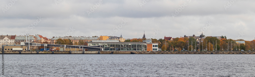 Passenger port in the city. View over the river Passenger port in the city. View over the river