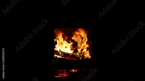 Fire flames are igniting and burning, blazing in dark. 4K ALL-I photo