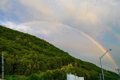 rainbow over the hill