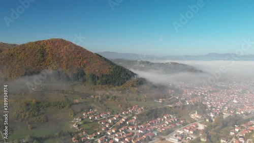 View of Visoko City next to the Bosnian pyramid of sun at sunny morning. Super wide aerial wide shot. photo