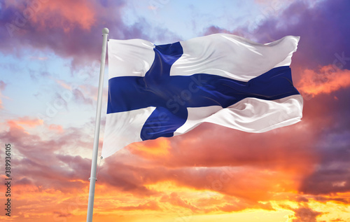 Large flag of Finland waving in the wind Fotobehang