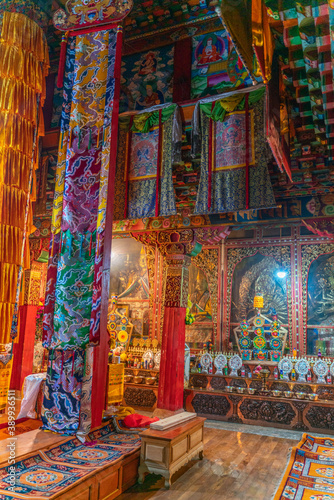 The view inside the ancient old buddhist temple on Tibet © Aleksey