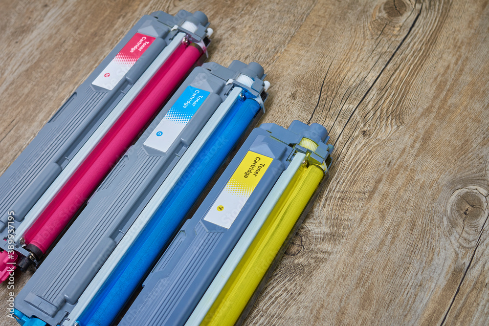 Color laser printer toner cartridges. Magenta, cyan, yellow. Color laser printer toner cartridges. Magenta, cyan, yellow.