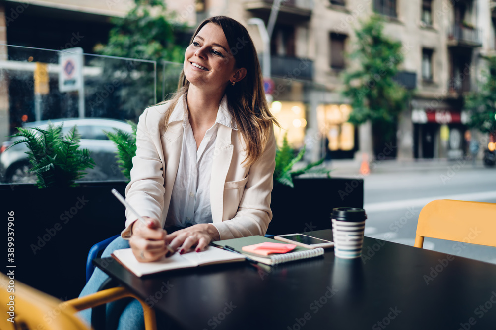 female entrepreneur in smart casual clothes planning business strategy while smiling at sidewalk terrace,successful female student with education textbook doing university homework in street cafe female entrepreneur in smart casual clothes planning business strategy while smiling at sidewalk terrace,successful female student with education textbook doing university homework in street cafe
