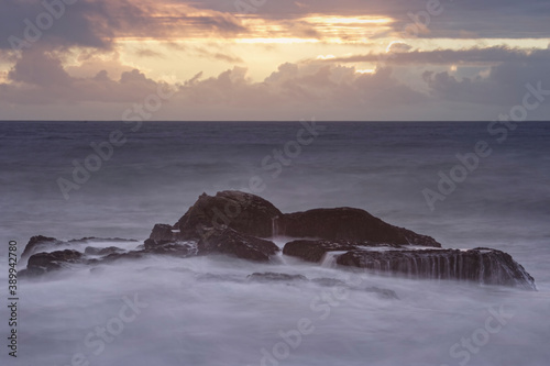 Sea rocks at dusk