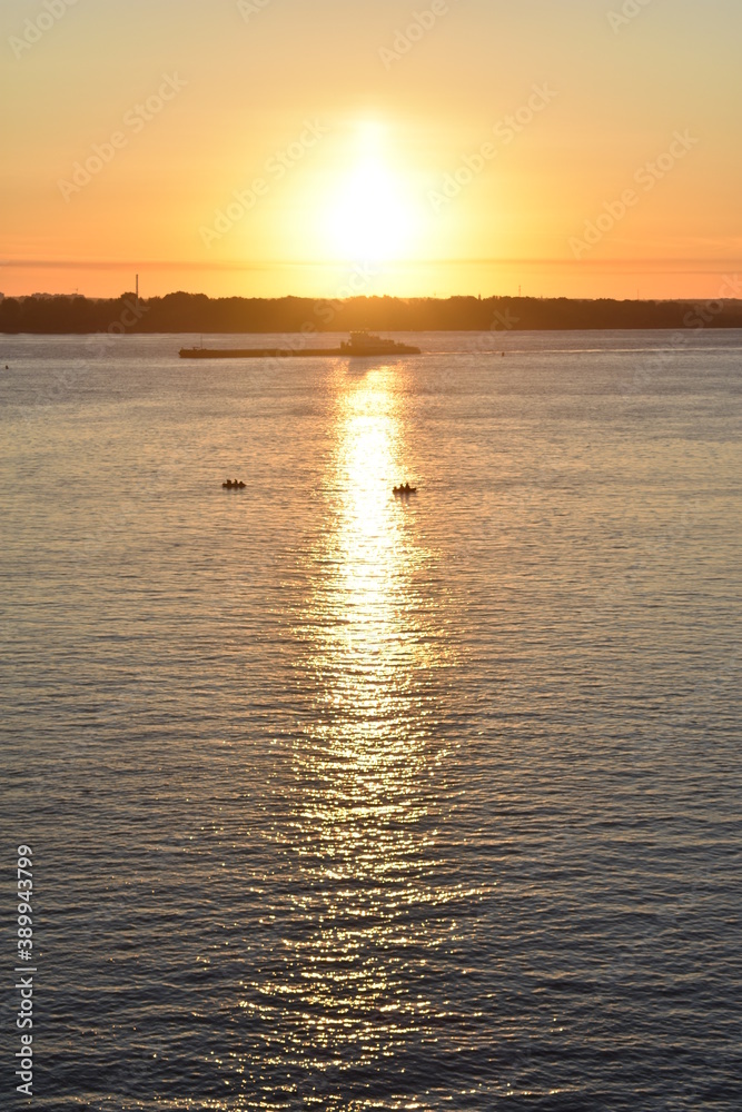 cargo ship sails at dawn on the Volga cargo ship sails at dawn on the Volga