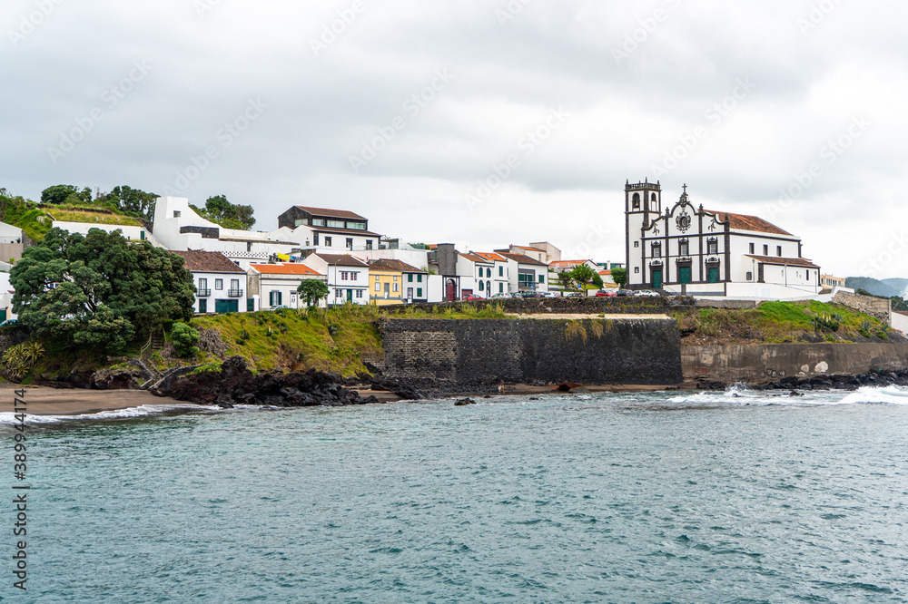 Portugal, Azores, Island of Sao Miguel. 
Beach Grande and the catholic church Sao Roque, 