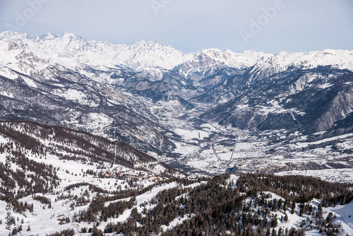 Risoul resort, French alps in winter, snowy mountains in France photo