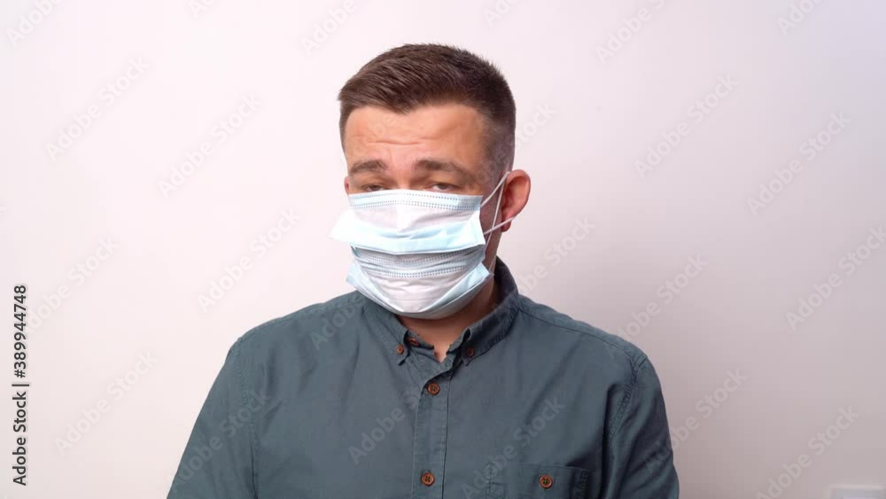 Funny man in two protective masks eats a banana. Funny man in two protective masks eats a banana.