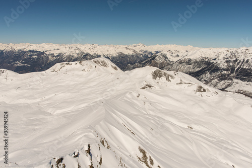 Risoul resort, French alps in winter, snowy mountains in France © Chawran
