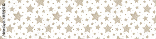 Christmas seamless pattern with hand drawn stars. Wrapping paper. Vector