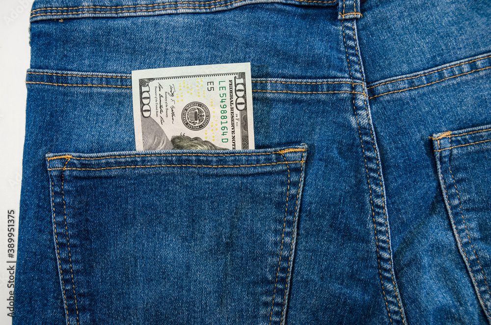 dollars in the pocket of blue jeans. Close-up. dollars in the pocket of blue jeans. Close-up.