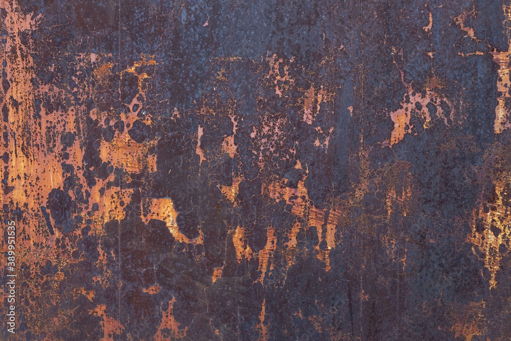 old rusty metal texture close-up with elements of peeled paint