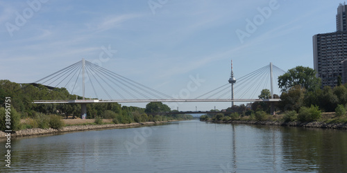 Mannheim / Germany – Sept. 13, 2020: cityscape with bridge at the „Rhine-Neckar harbor“, one of the biggest european inner harbors, known for sustainability and environment protection.