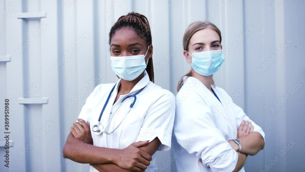 Portrait of doctors with face masks, coronavirus, covid-19 and vaccination concept. Portrait of doctors with face masks, coronavirus, covid-19 and vaccination concept.