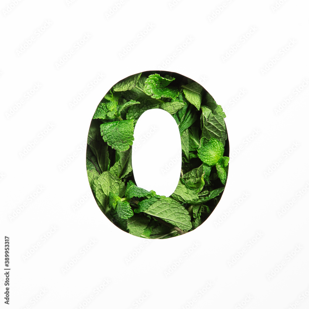 Green mint number zero made of natural leafs and paper cut null shape isolated on white. Typeface from leaves Green mint number zero made of natural leafs and paper cut null shape isolated on white. Typeface from leaves