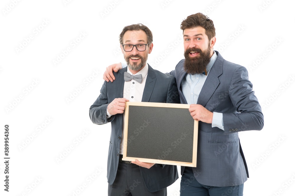 Day meeting. formal businessmen, copy space. welcome on board. partners celebrate start up business isolated on white. announcement. party invitation. bearded men hold advertisement blackboard Day meeting. formal businessmen, copy space. welcome on board. partners celebrate start up business isolated on white. announcement. party invitation. bearded men hold advertisement blackboard