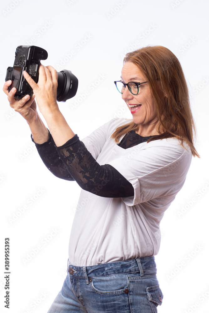 woman with camera taking selfie