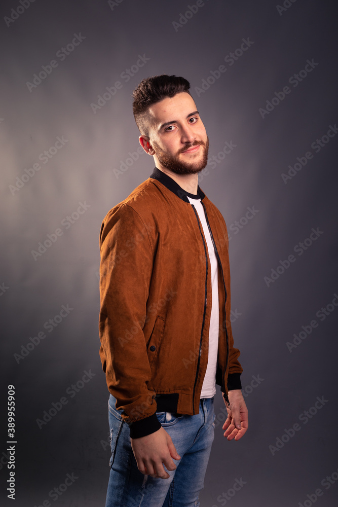 Handsome man posing at a studio