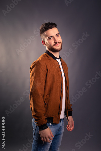 Handsome man posing at a studio