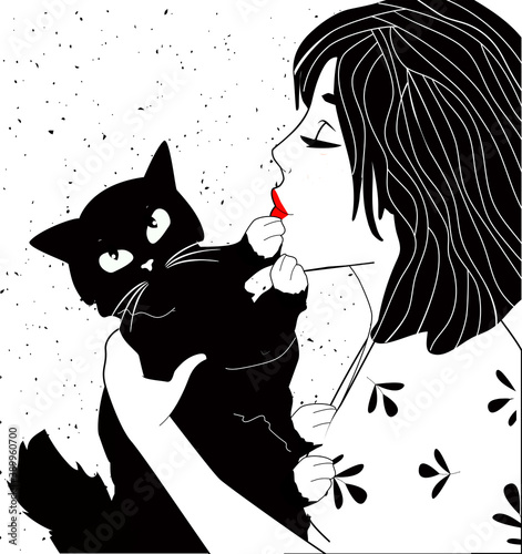 Young beautiful woman kissing cat
