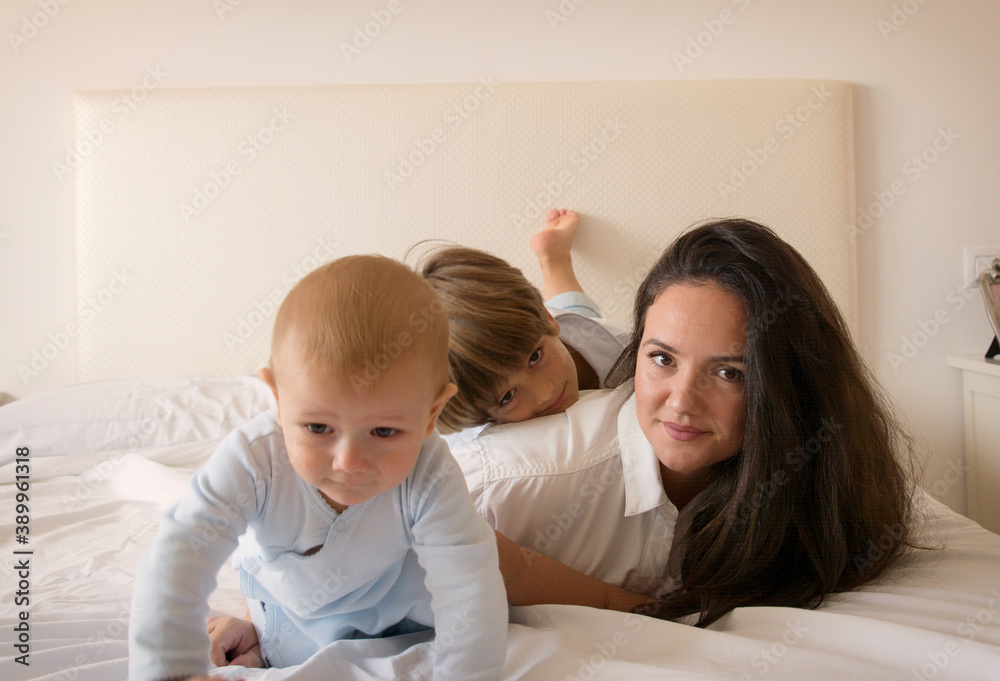 Mom And Children Playing.
A Mother And Her Children Play In Bed. Family Lifestyle. Mom And Children Playing.
A Mother And Her Children Play In Bed. Family Lifestyle.