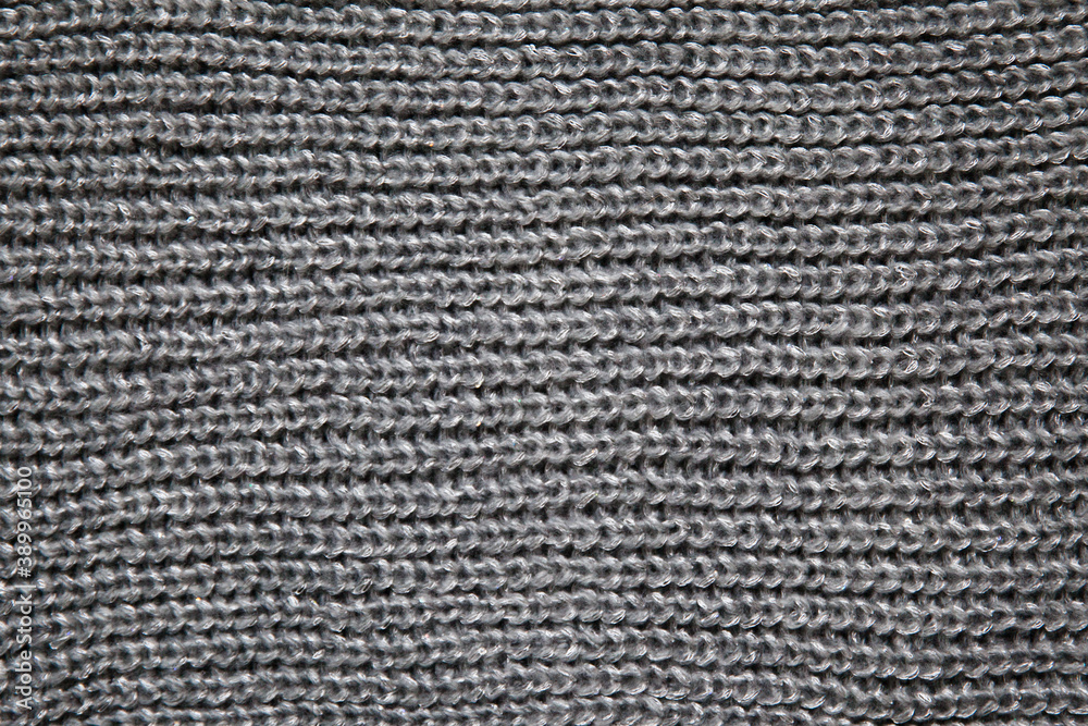 Gray wool knitted fabric. Gray wool knitted fabric.