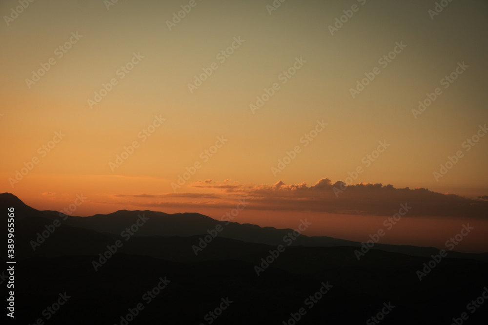 Silhouette of hills at sunset