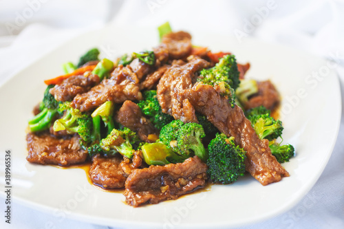A view of a plate of beef broccoli.