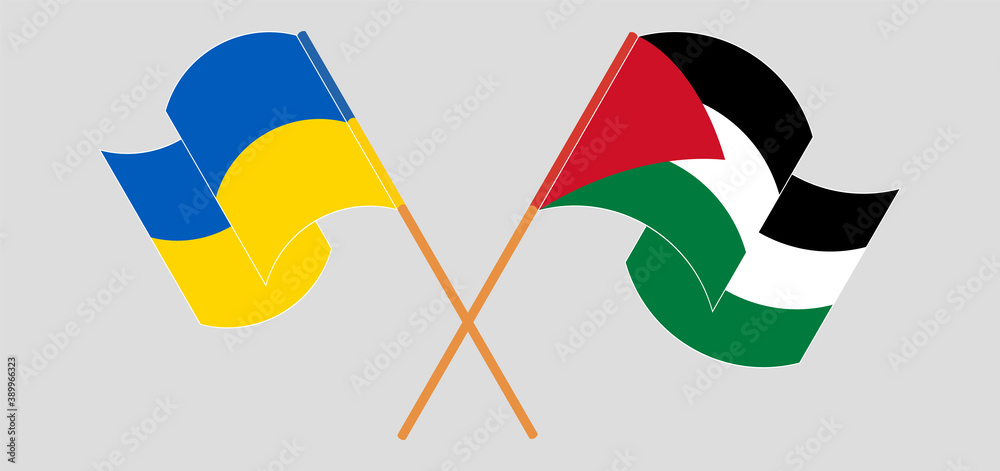 Crossed and waving flags of Palestine and the Ukraine Crossed and waving flags of Palestine and the Ukraine